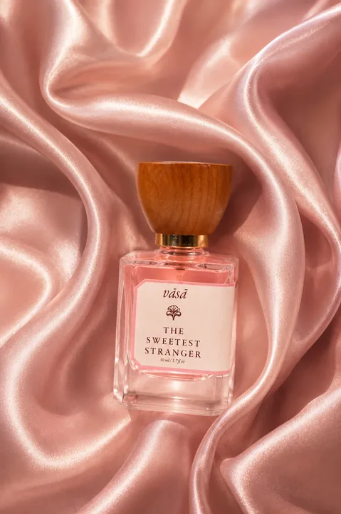 Sweetest Stranger on folds of blush pink satin